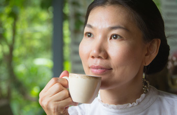 woman with cup of tea